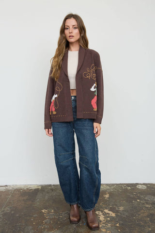 Brown knit cardigan with cowboy jacquard pattern and shawl collar, open front