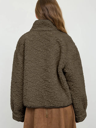Taupe sherpa jacket with mock neck and boxy fit, back view