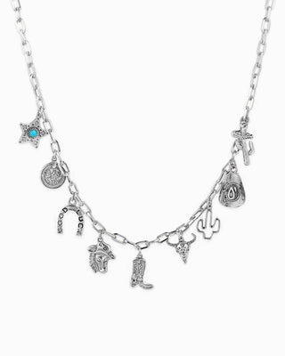 Sessori silver western charm necklace with cowboy boot, cactus, horseshoe, and turquoise star charms