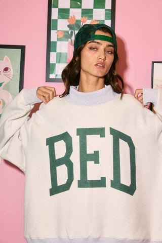 The 'GYM & BED' Print Reversible Mockneck Sweatshirt