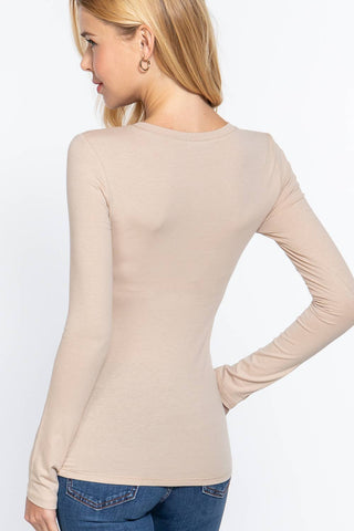Women's long sleeve crew neck fitted top in beige, back view