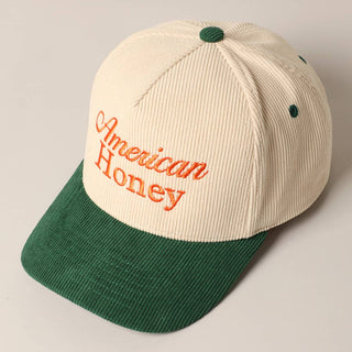 Cream and green corduroy baseball cap with orange American Honey embroidery