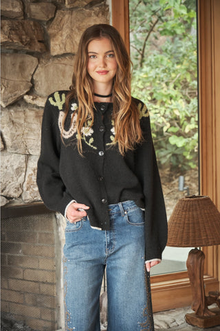 Charcoal black western graphic knit cardigan with cactus floral intarsia pattern and dark buttons