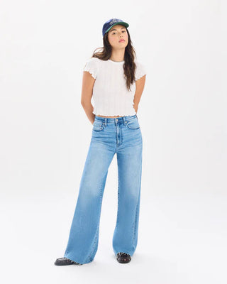 High rise wide leg light wash blue jeans with frayed hem details