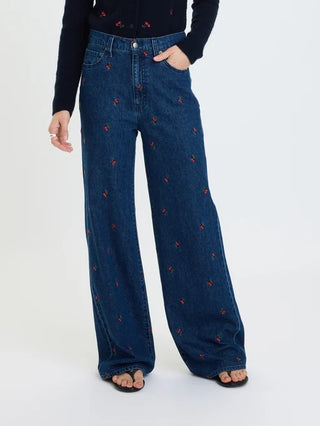 High rise wide leg dark wash jeans with red cherry embroidery pattern