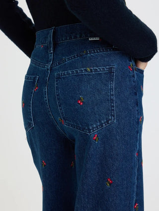 Dark wash wide leg jeans with allover red cherry embroidery, back view