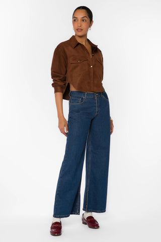 Cropped brown faux suede button-up shirt jacket with chest pockets and collar