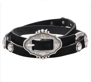 Black faux leather belt with ornate silver buckle and round crystal conchos