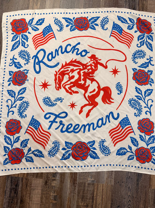 White wild rag bandana with red cowboy and blue rose paisley American flag print