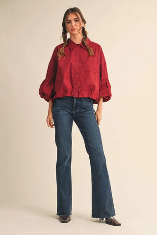 Burgundy cropped button-down top with balloon sleeves and bubble hem