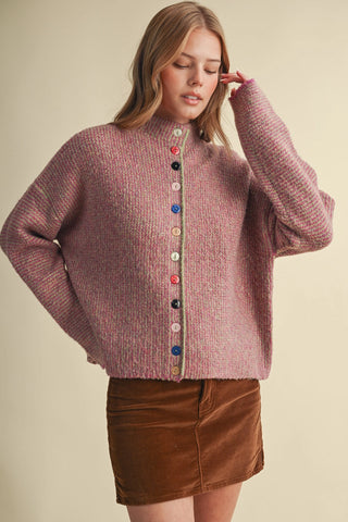 Oversized fuchsia multicolor knit cardigan with colorful mismatched buttons and lime trim