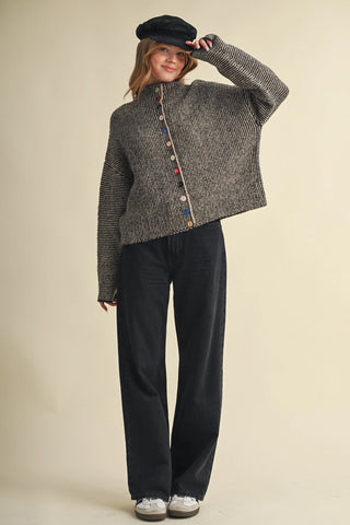 Black and taupe marled knit cardigan with colorful mixed buttons and mock neck