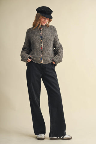 Black and taupe marled knit cardigan with colorful mixed buttons and mock neck