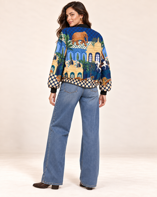 Blue silk blend bomber jacket with Indian palace and elephant print, back view