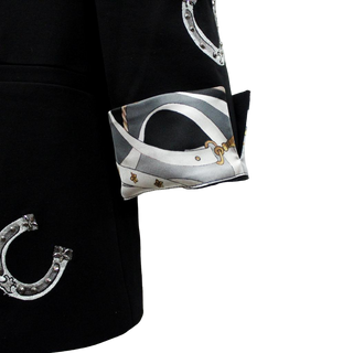 Black blazer with silver horseshoe appliqués and equestrian-print silk cuff detail