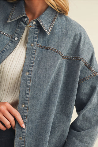 Oversized washed denim button-up tunic top with rhinestone stud trim detailing