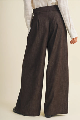 Espresso brown wide-leg linen pants with high waist and pleat detail, back view