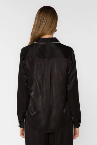 Black satin Western shirt with white piping trim, back view, long sleeves