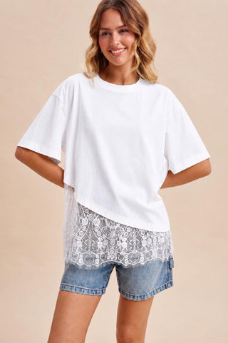 Annie Wear white oversized tee with floral lace asymmetrical hem trim