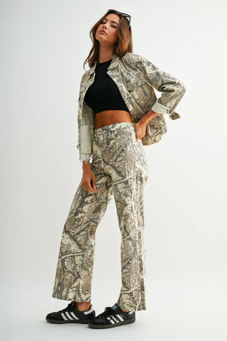 High rise wide leg jeans in tan and green tree camo print