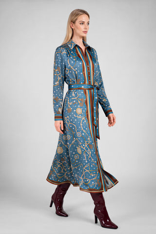 Model wearing a long sleeve button-down midi dress with chain print and belted waist