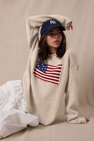 woman in taupe american flag sweater