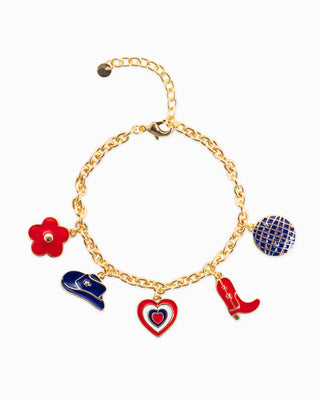 A gold-tone bracelet with charms in the shapes of a cowboy boot, a hat, a heart, and a disco ball, with red, white, and blue colors.