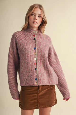 Oversized fuchsia multicolor knit cardigan with multicolored buttons and lime green trim