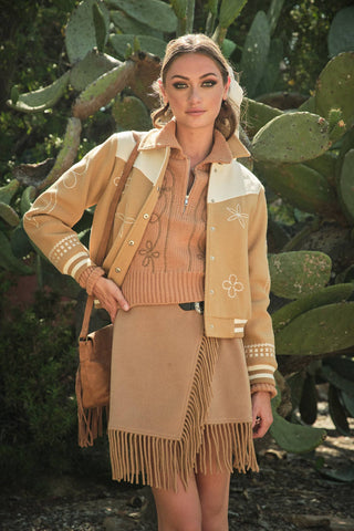woman wearing embroidered bomber jacket