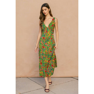 Woman wearing a floral dress against a beige background