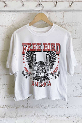 White long crop top with a graphic of an eagle and the text 'FREE BIRD AMERICA' on the front.