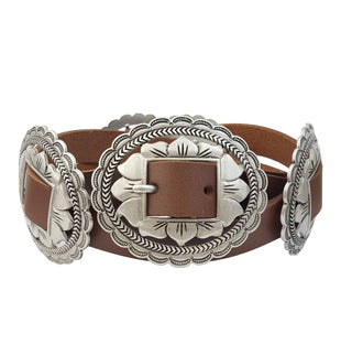 Brown leather belt with silver concho buckle on a white background