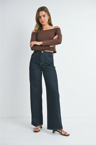 Dark indigo wide leg high-rise jeans with contrast stitching and relaxed fit