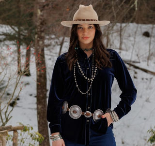 Navy blue velvet long-sleeve button-front shirt with relaxed silhouette, hip length