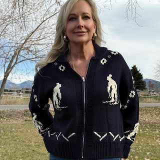 woman wearing sweater with skiers