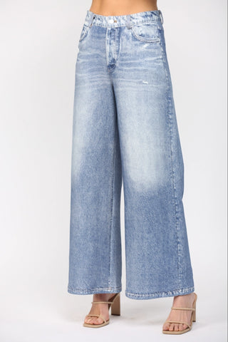 Woman wearing light denim jeans 