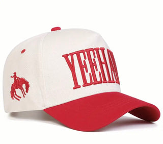 White and red cap with 'Yeehaw' text and horse logo on a white background