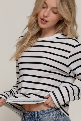 White and black striped long sleeve round neck crop tee on female model
