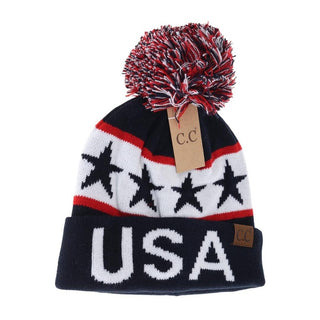 Navy USA knit pom beanie with red white stars stripes and multicolor pompom