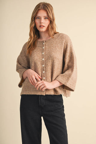 Taupe button-front oversized cardigan with elbow-length sleeves and ribbed neckline