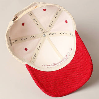 Cream and red corduroy trucker cap interior view showing C.C brand lining