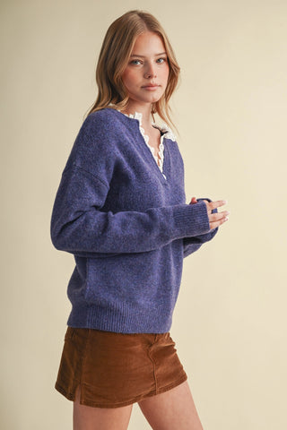Purple knit sweater with white eyelet lace ruffle collar, paired with brown corduroy mini skirt