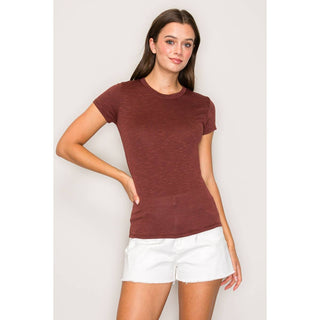 Women's burgundy ribbed crew neck short sleeve fitted basic tee with white denim shorts