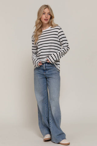 White long sleeve tee with black horizontal stripes and round neckline