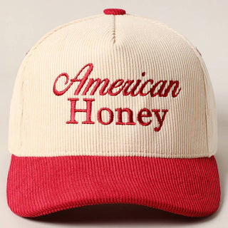 Cream and red corduroy baseball cap with American Honey embroidered text