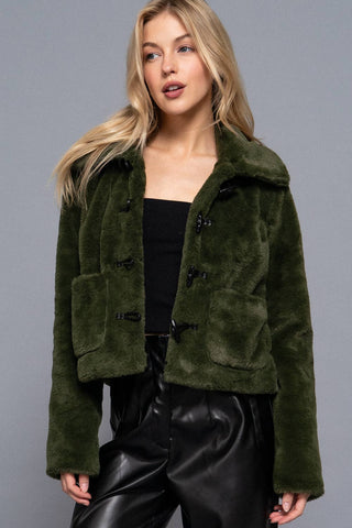 Olive green faux fur duffle jacket with black toggle buttons and front pockets