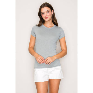 Light gray ribbed crew neck short sleeve fitted basic tee on model with white shorts