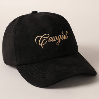 Black suede baseball cap with gold embroidered Cowgirl script on front