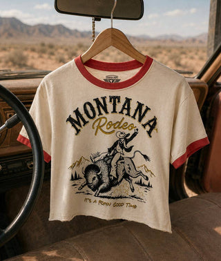 Cream crop ringer tee with red trim and Montana Rodeo buffalo rider graphic