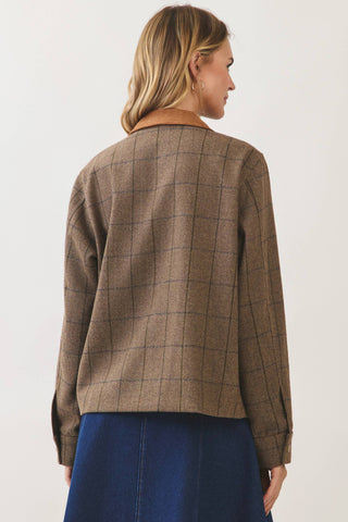 Back view of a plaid chore jacket with suede collar, long sleeves, and cuffed wrists